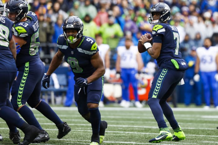 Jan 8, 2023; Seattle, Washington, USA; Seattle Seahawks quarterback Geno Smith (7) looks to pass against the Los Angeles Rams during the first quarter at Lumen Field.